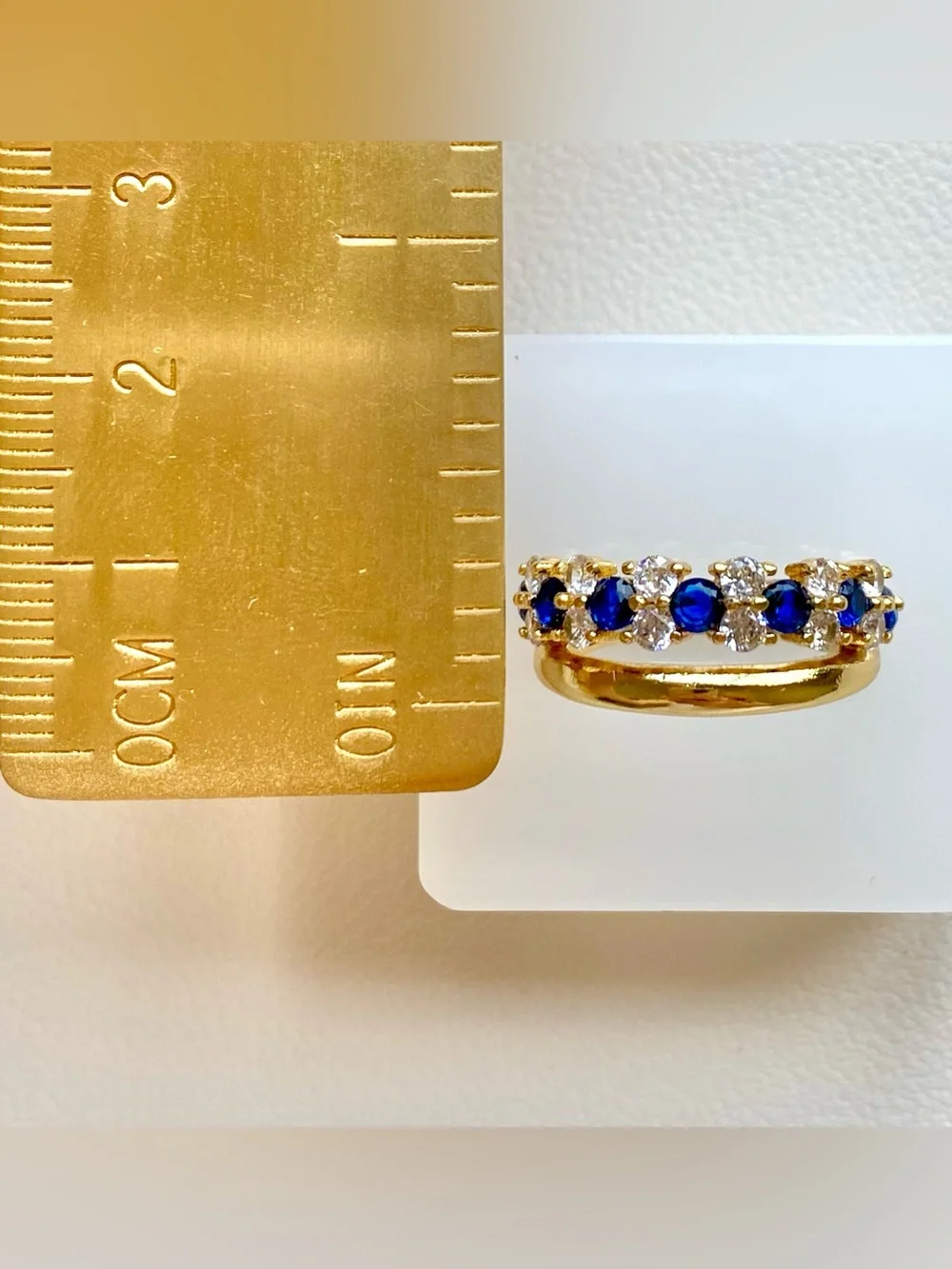Gold Band Ring with Blue Sapphire and White CZ Accents